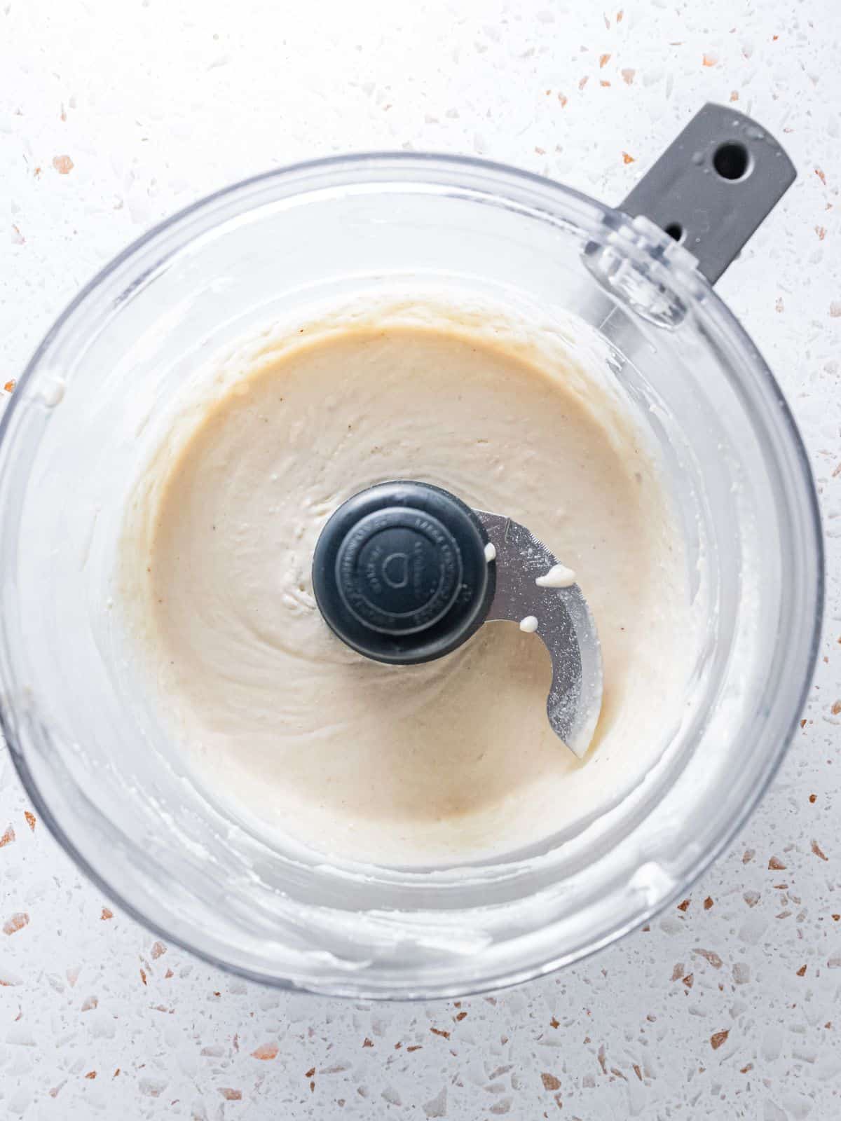 Cashew icing in the food processor.