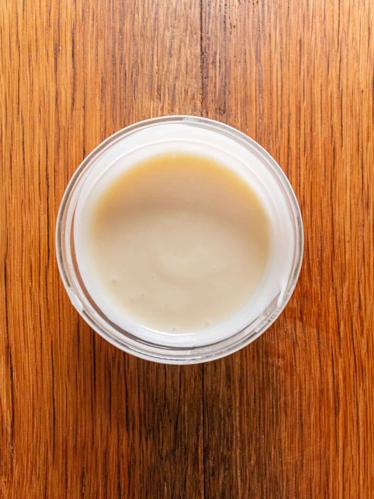 The glaze in a small mixing bowl.