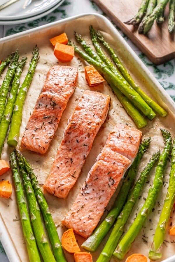 Sheet pan salmon with sweet potatoes and asparagus.
