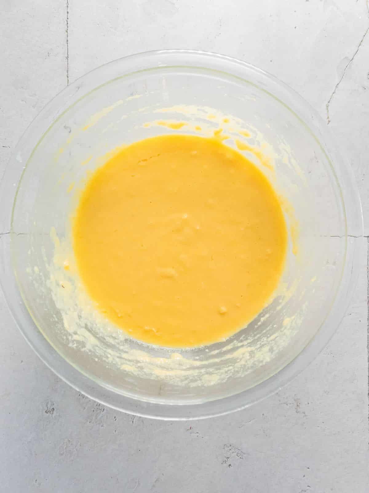Flour and the remaining ingredients mixed in the bowl.