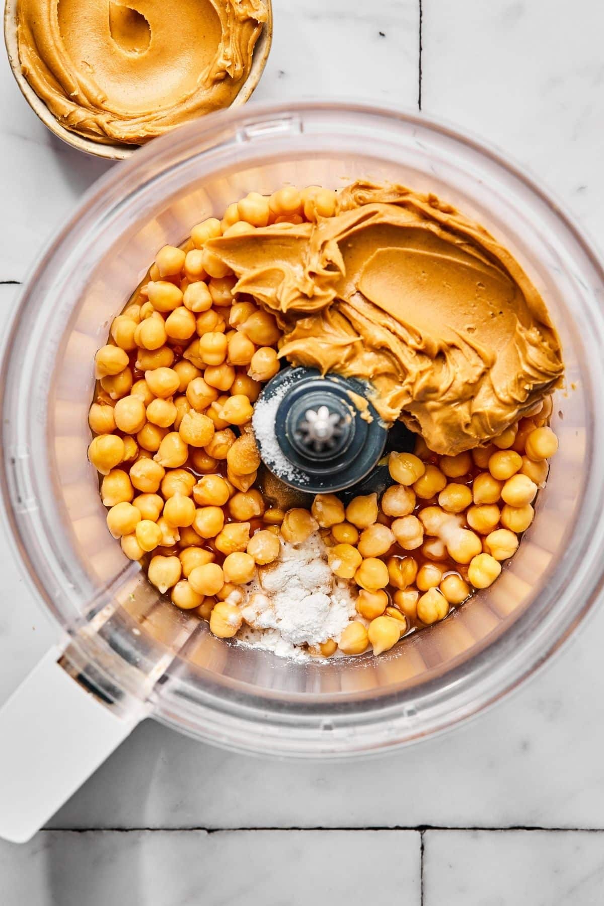 All the ingredients except chocolate chips into the food processor.