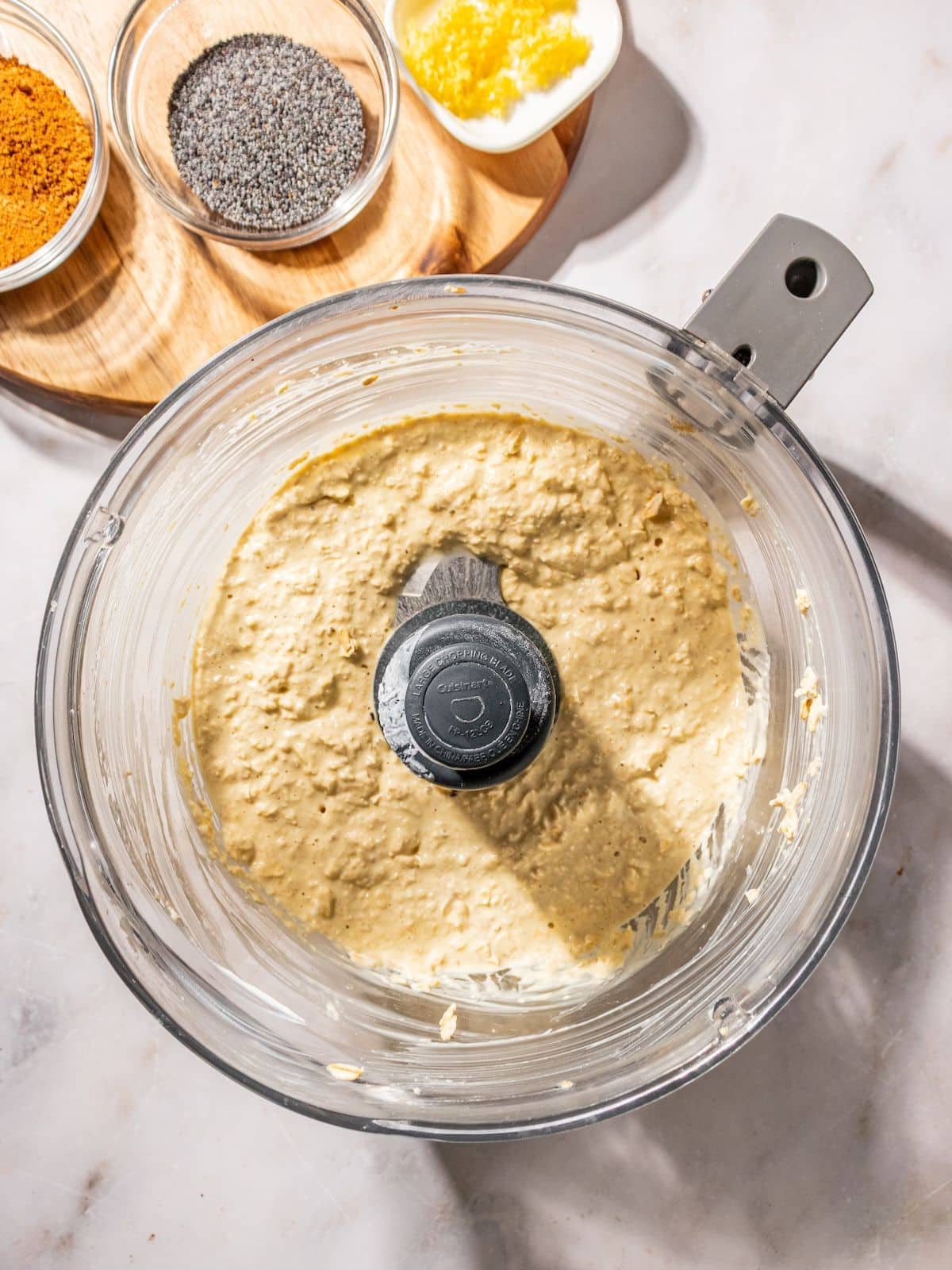 Oats, Greek yogurt, eggs, milk, orange extract, and lemon juice in the blender.