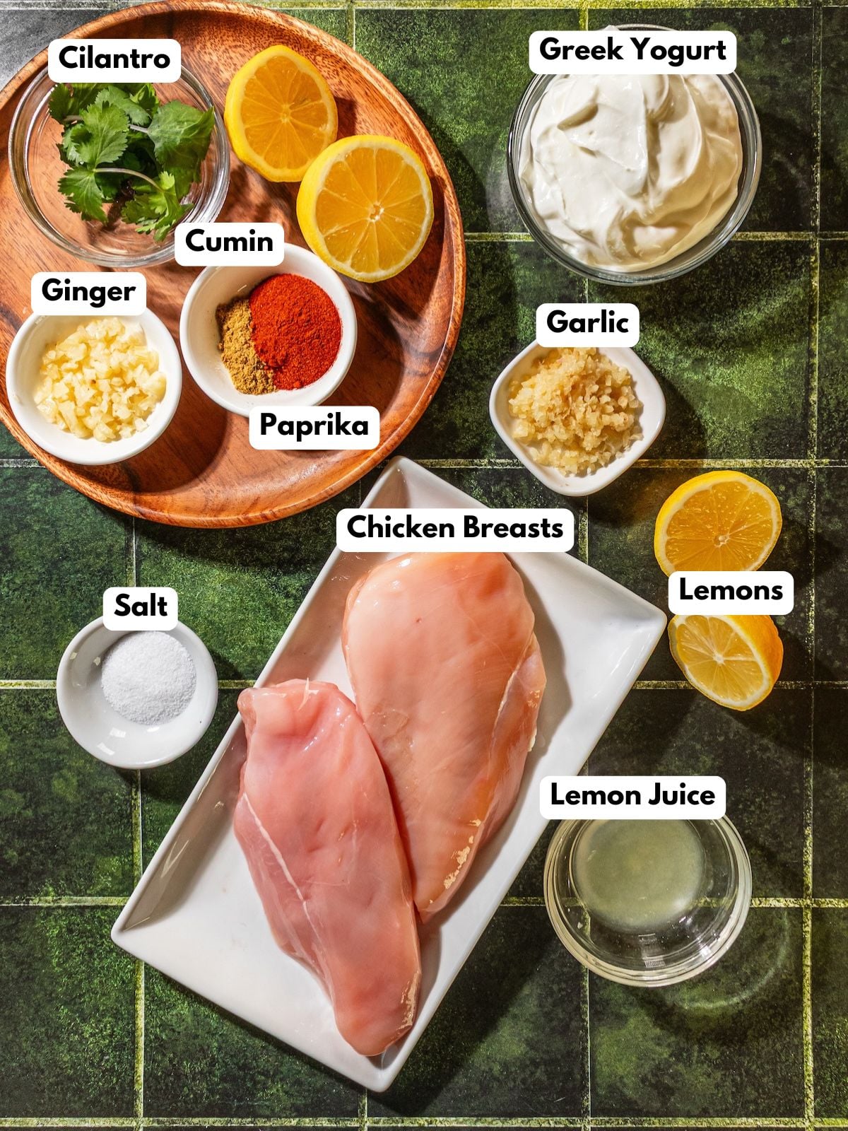 Ingredients to make Greek yogurt chicken on a table.