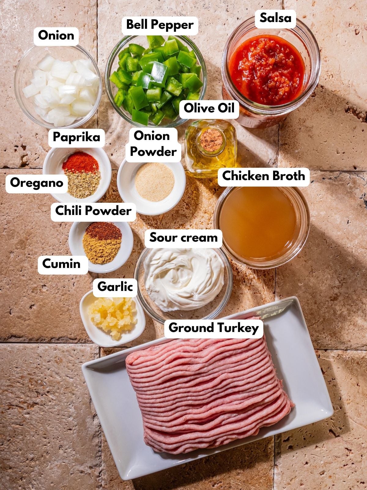 Ingredients to make this taco soup in bowls on a table.