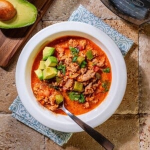 A spoon scooping out some Instant pot taco soup.