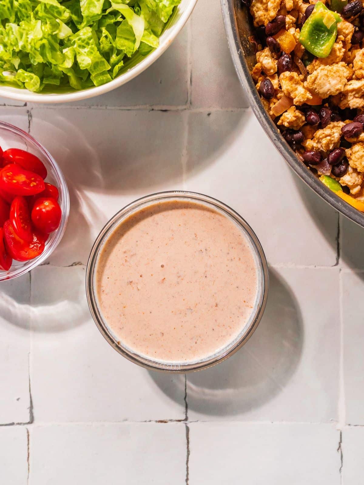 Greek yogurt and salsa mixed in a bowl.