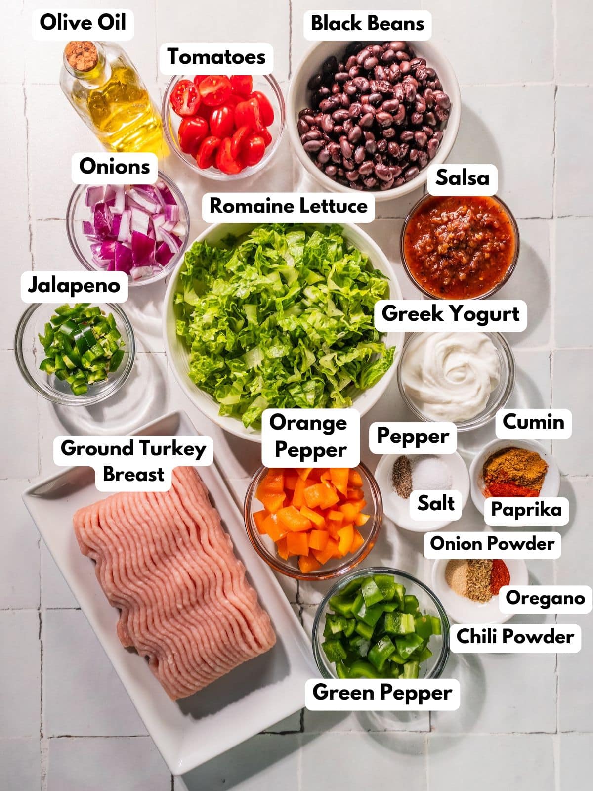 Ingredients to make this healthy taco salad on a table.