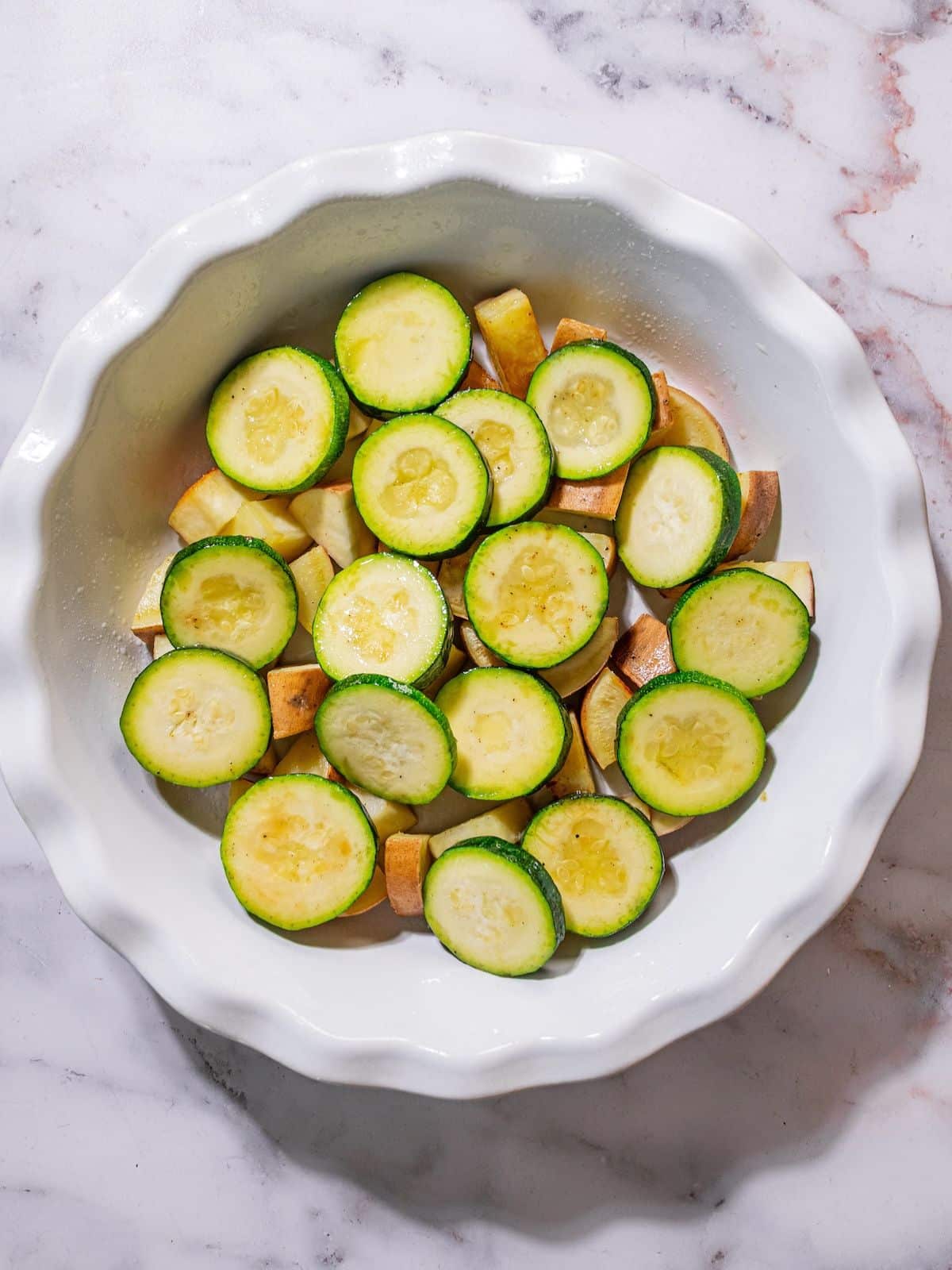 Zucchini over the sweet potatoes.