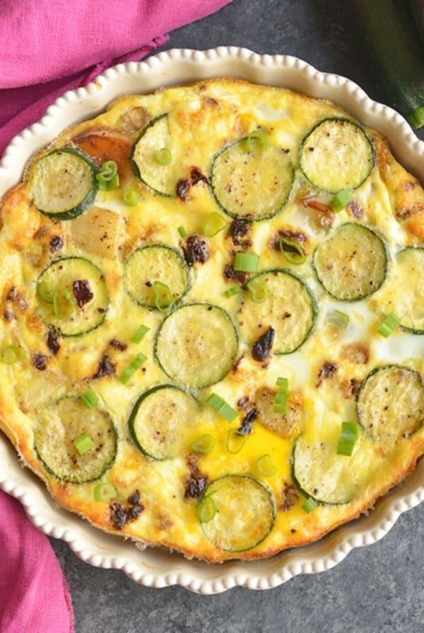 A sweet potato egg bake with zucchini on top.