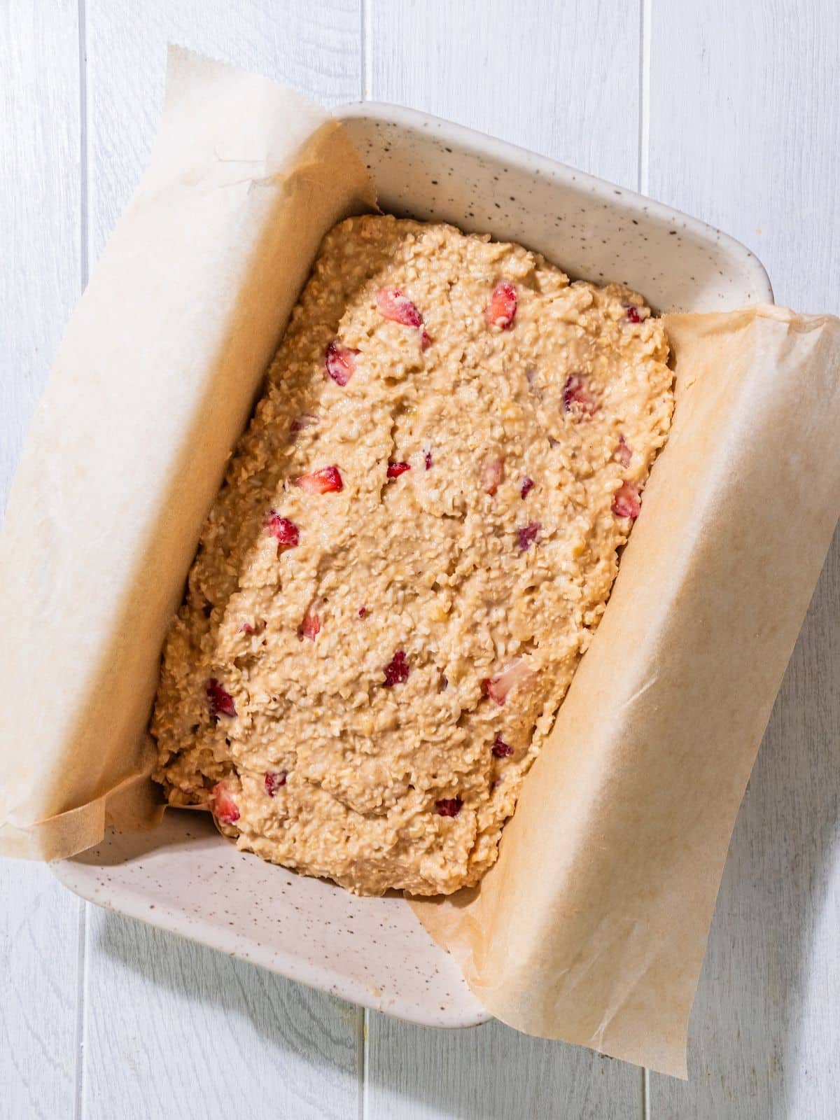 The bread mixture added to a bread pan.