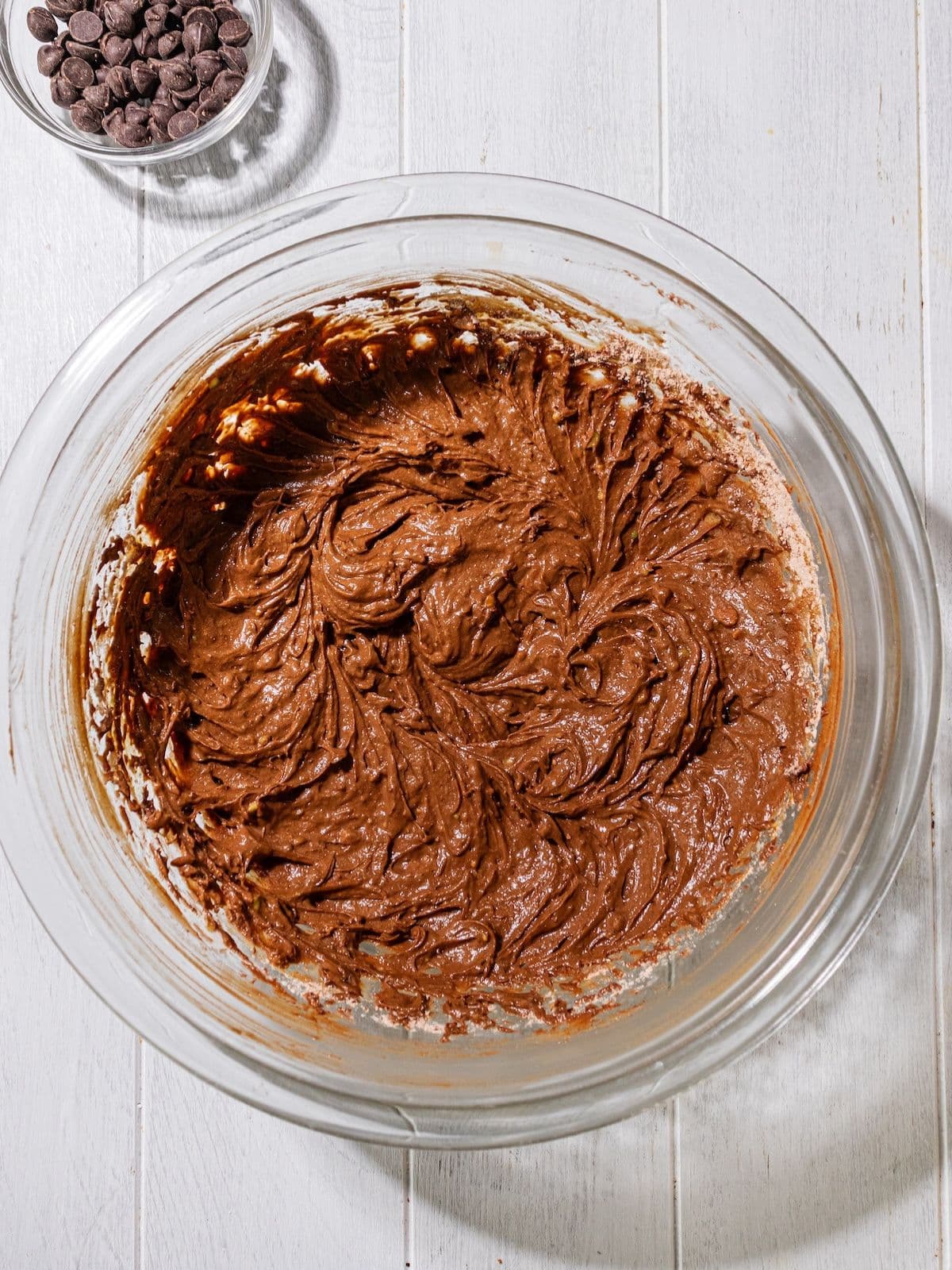 Gluten free flour, cacao powder, salt and baking powder combined in a bowl.