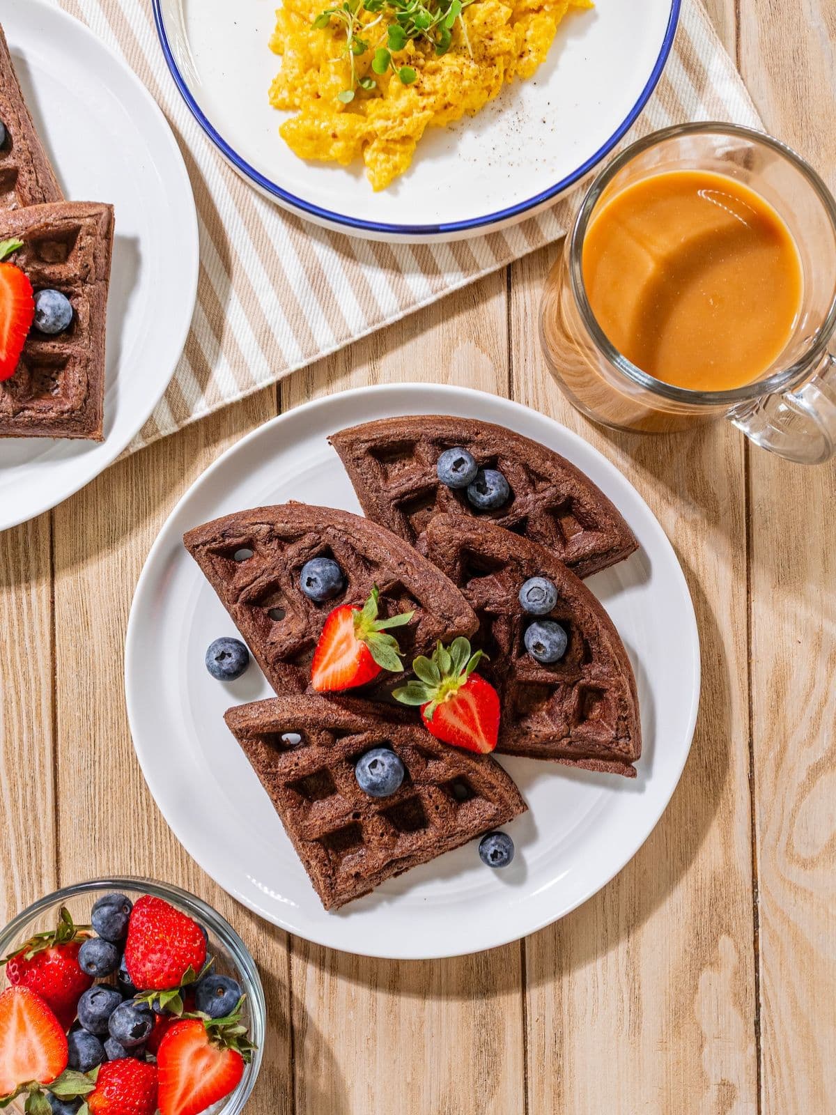 A plate filled with chocolate waffles.