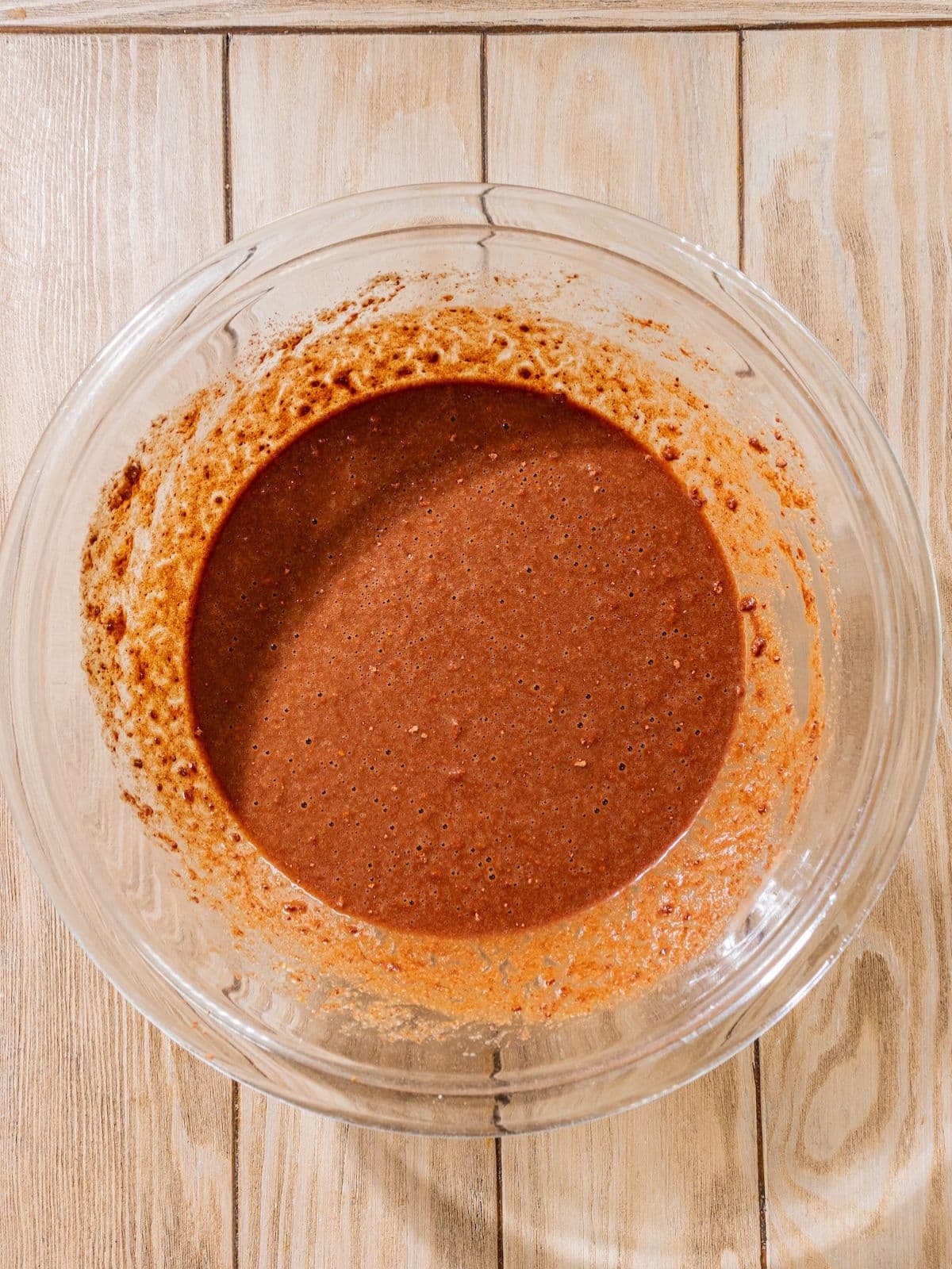 Cacao powder added to the egg mixture.