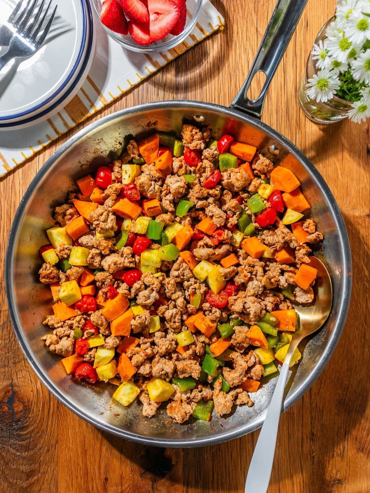 The hash cooking in the pan.