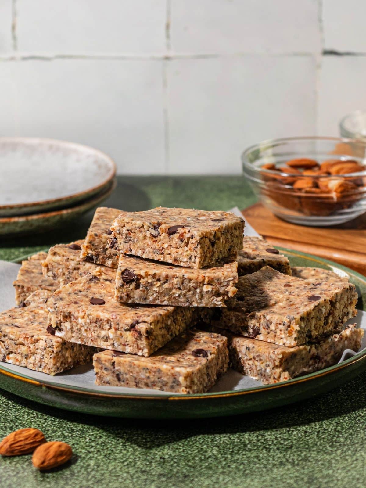 Gluten free granola bars stacked on a plate.