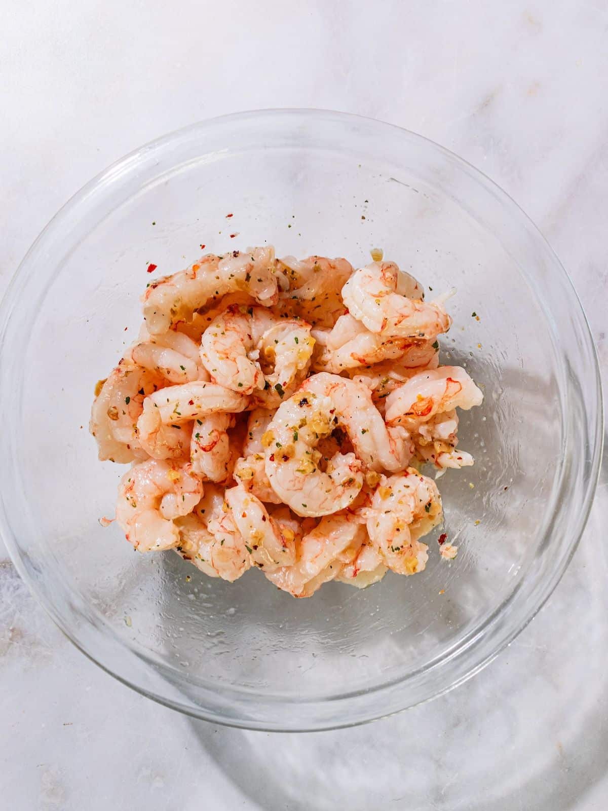 Shrimp wih spices in a bowl.