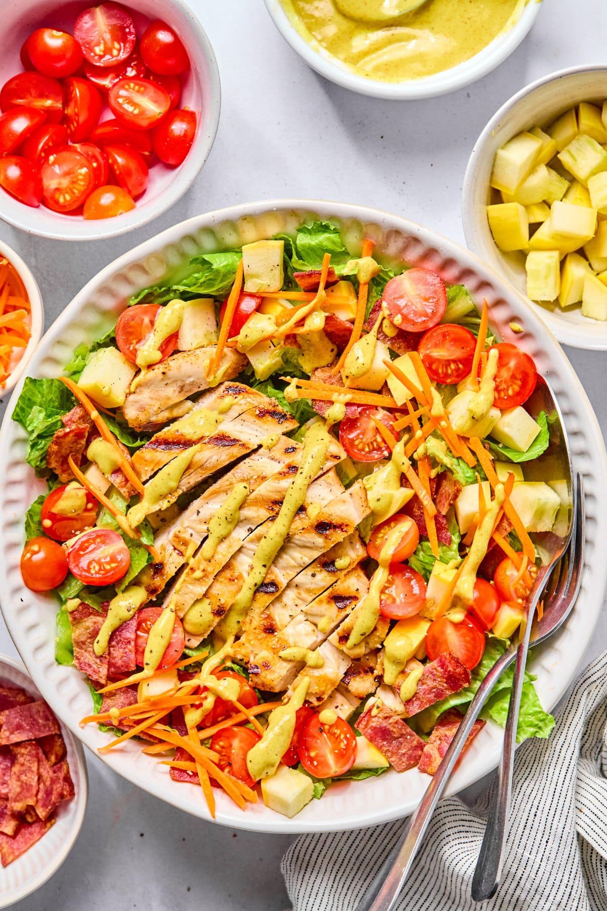 Salad mixed together and dressing added on top.
