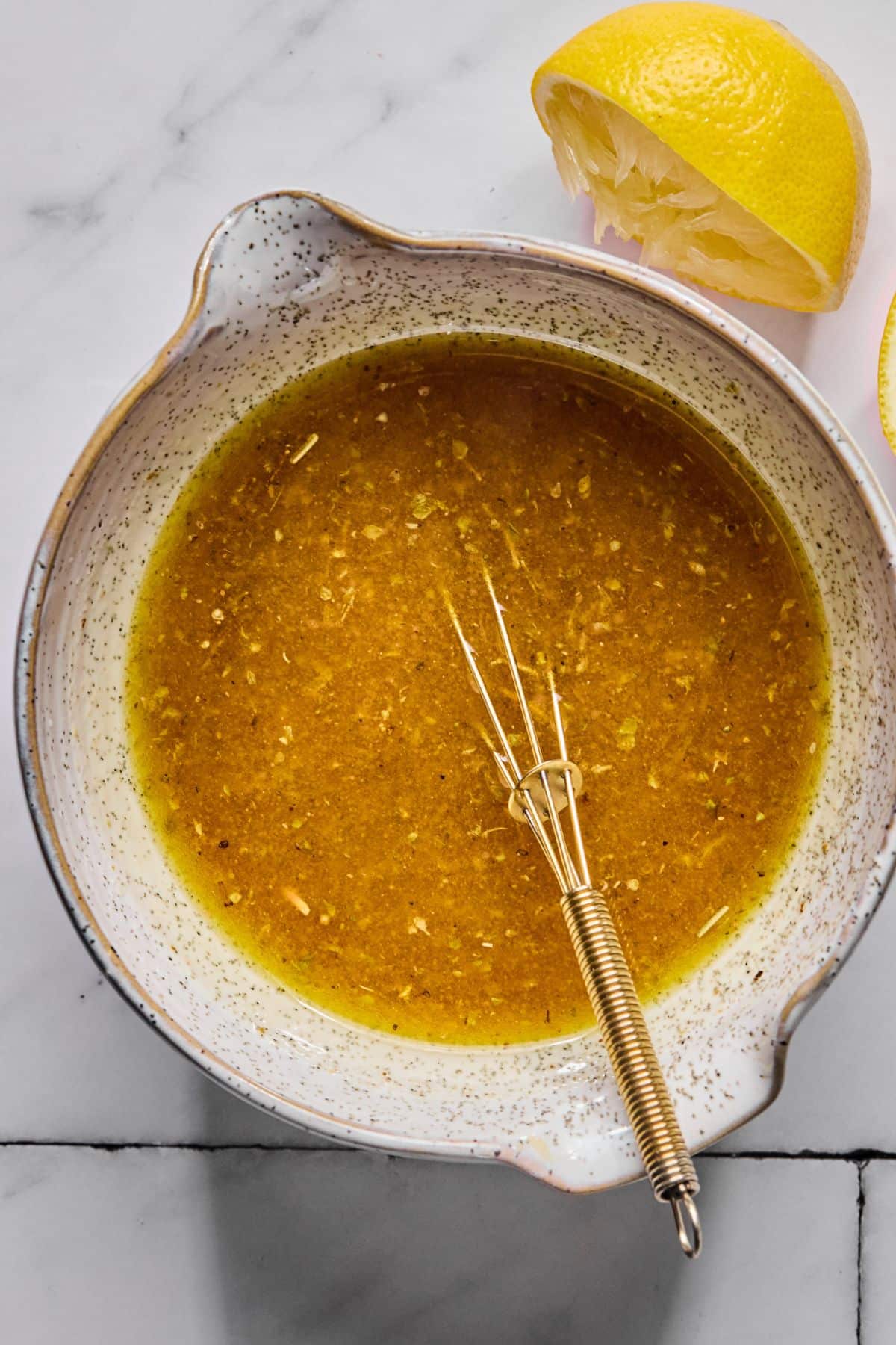 All the ingredients for the dressing in a bowl.