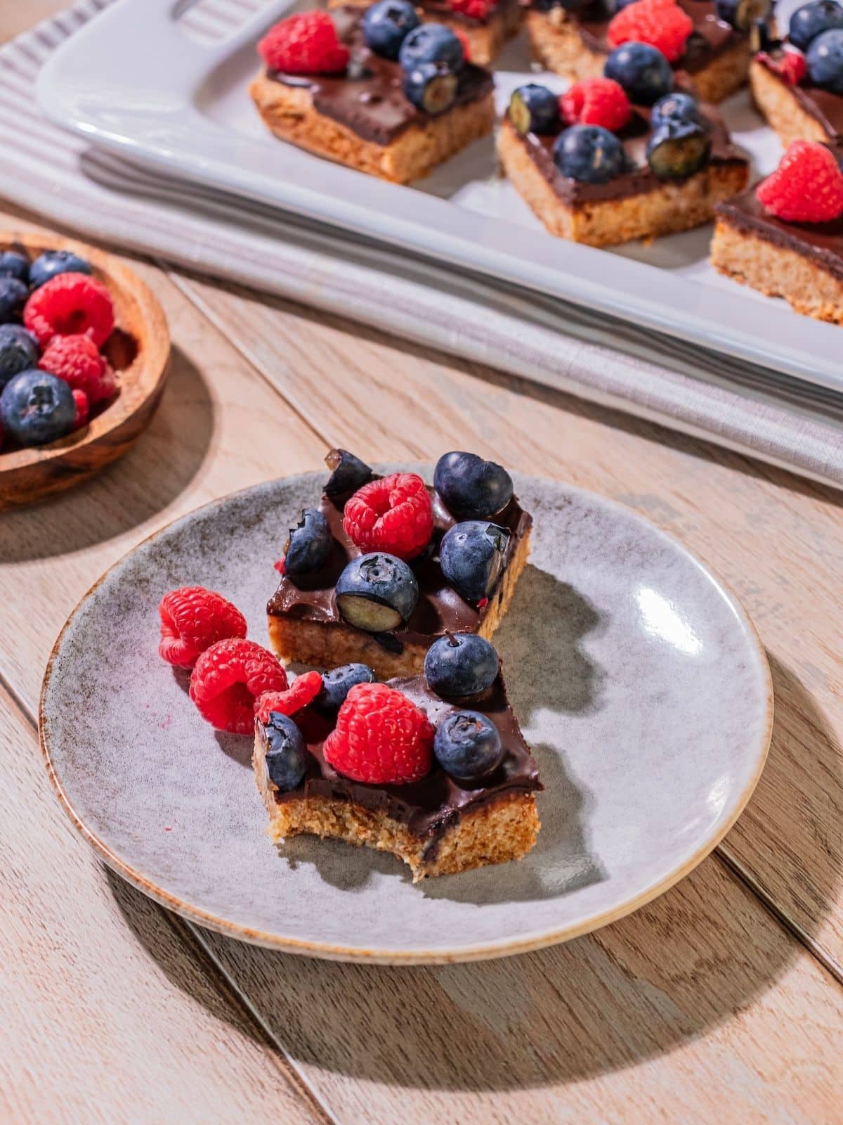 Berry bars with a bite taken out of one of the bars.