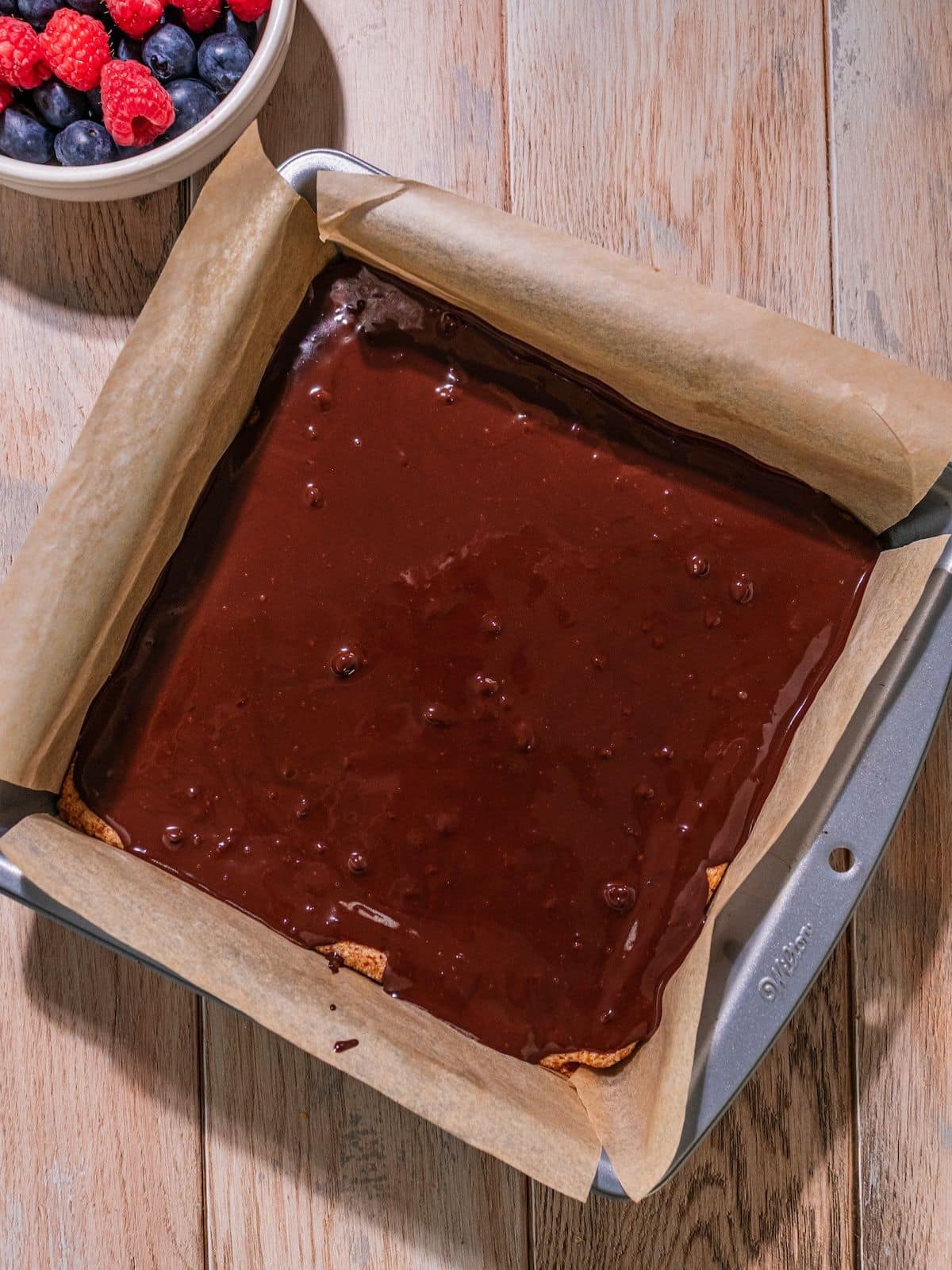 Melted chocolate poured over the crust.