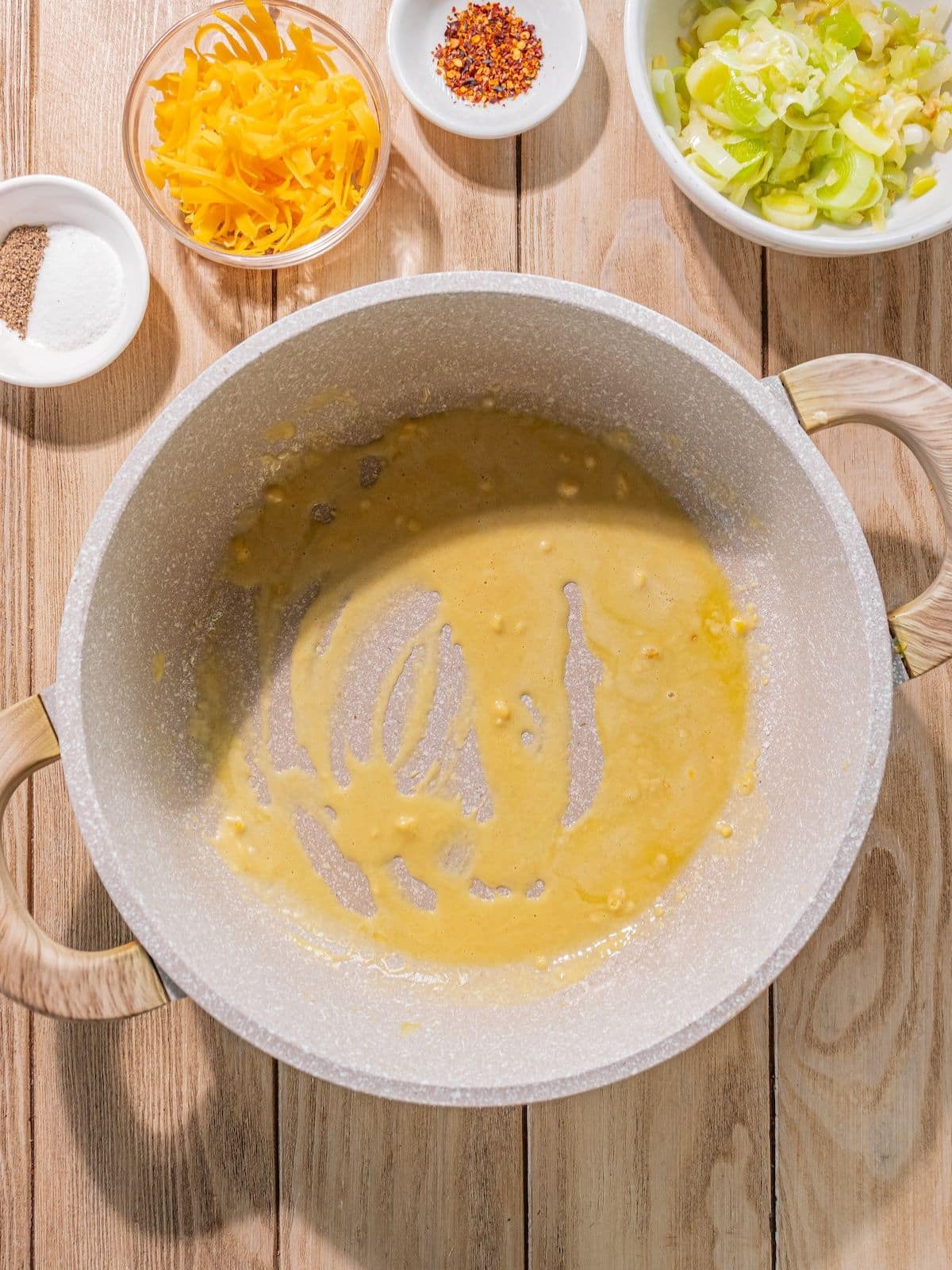 Olive oil and flour in a pot to make a roux.