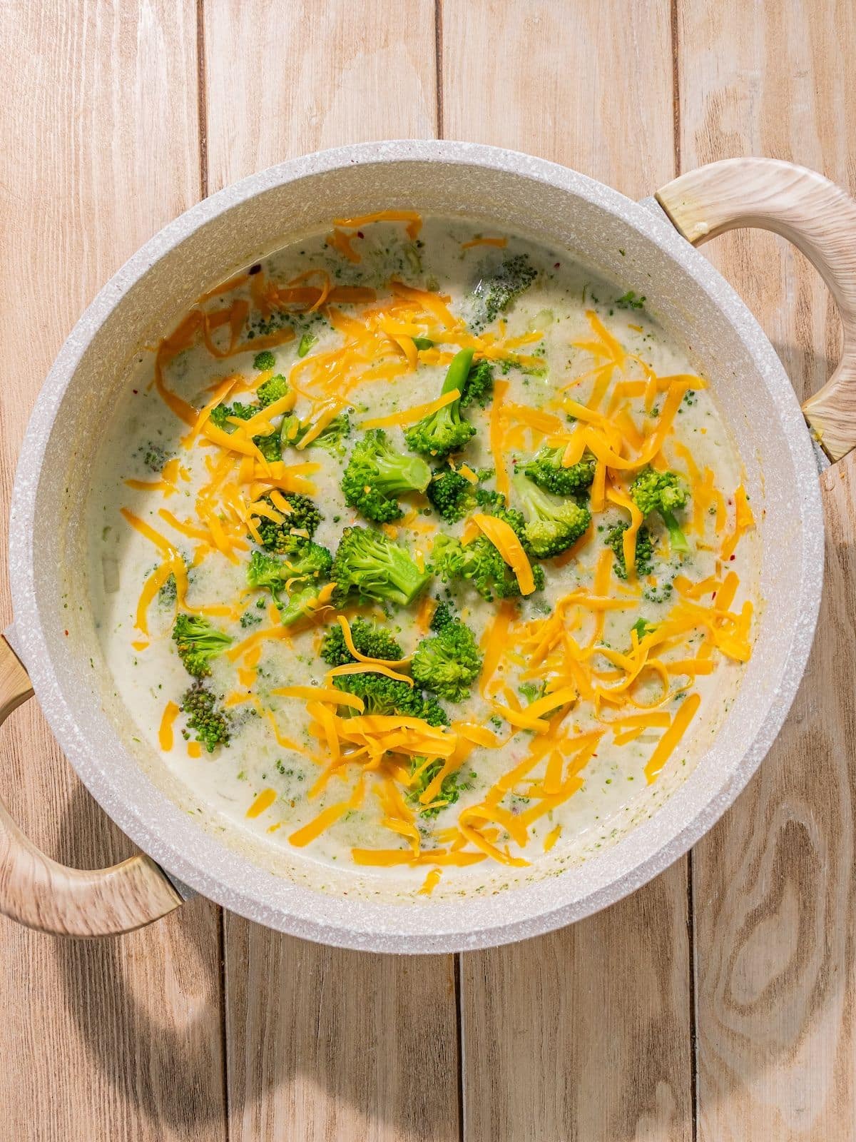 The remaining broccoli and cheddar added to the pot.