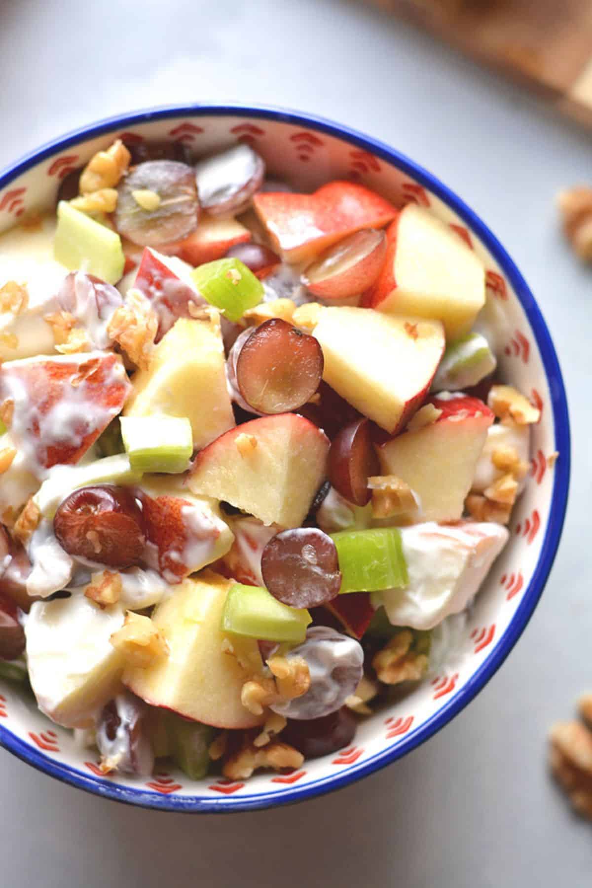 A bowl filled with waldorf salad.
