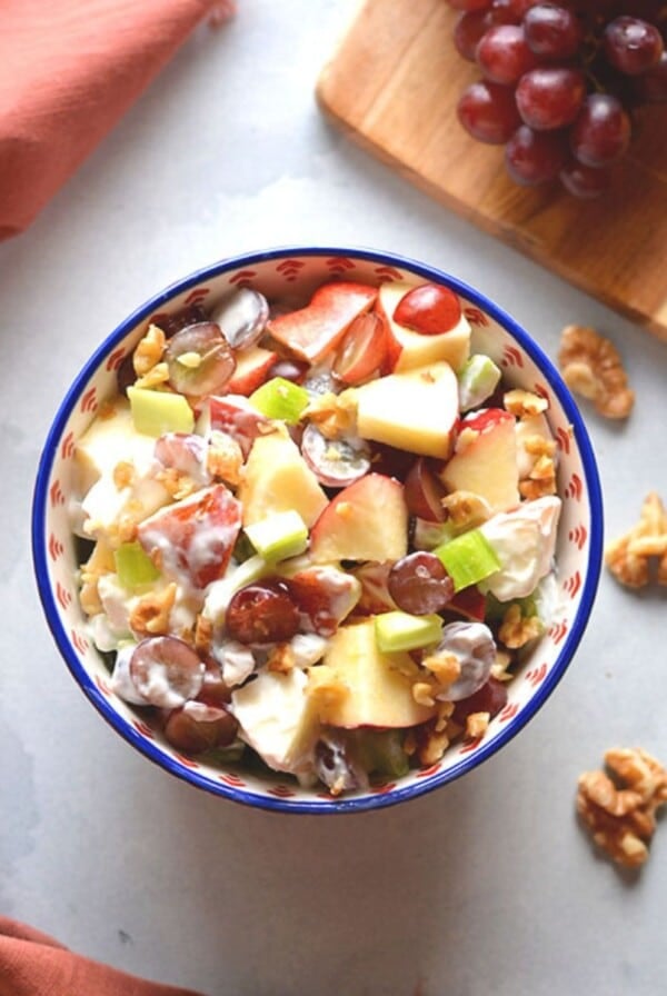 A bow filled with healthy waldorf salad.