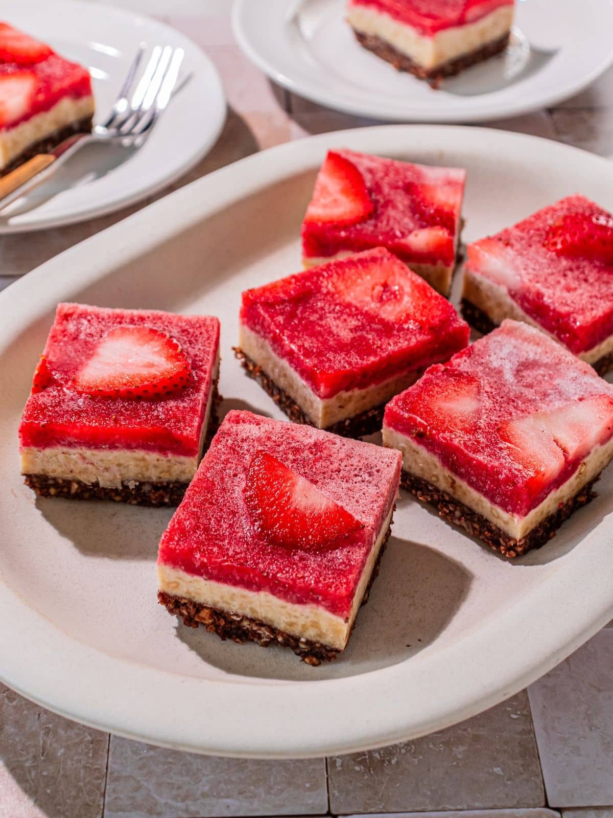 Slices of no-bake strawberry cake on a plate.
