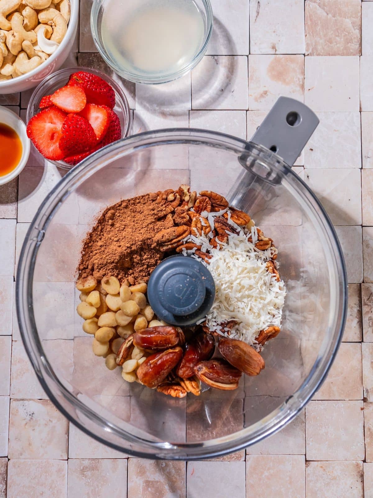 All the ingredients added to a food processor.