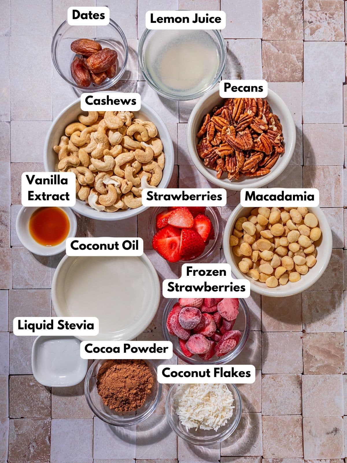Ingredients to make this healthy strawberry cake in bowls on a table.