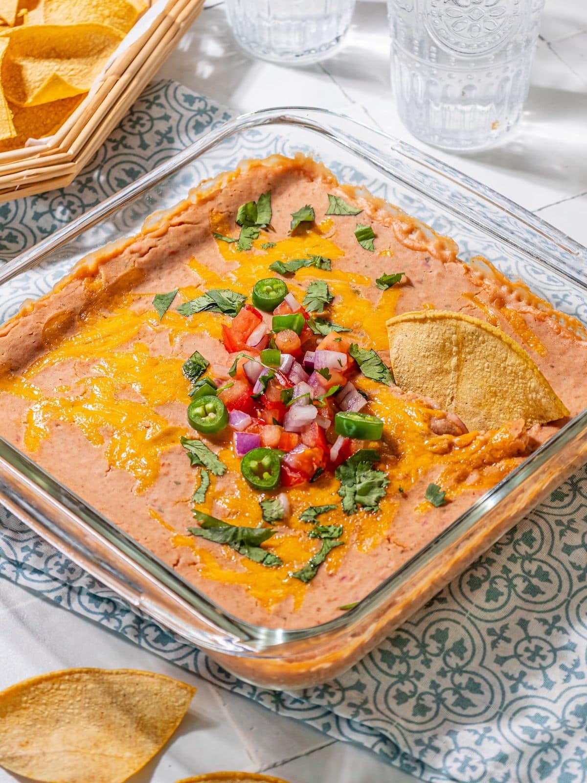 Pinto bean dip in a casserole dish.