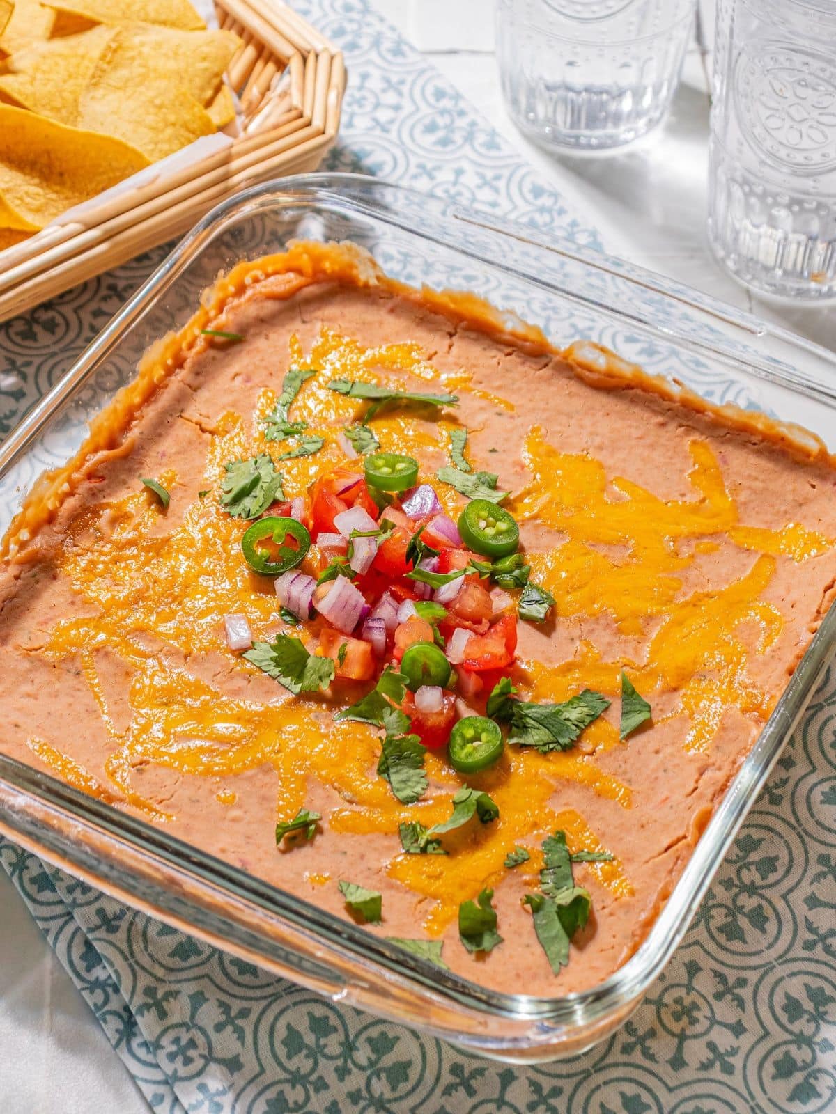 Toppings added over top of the bean dip.