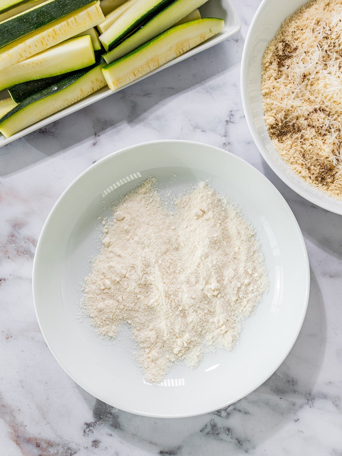 Coconut flour in a shallow bowl.