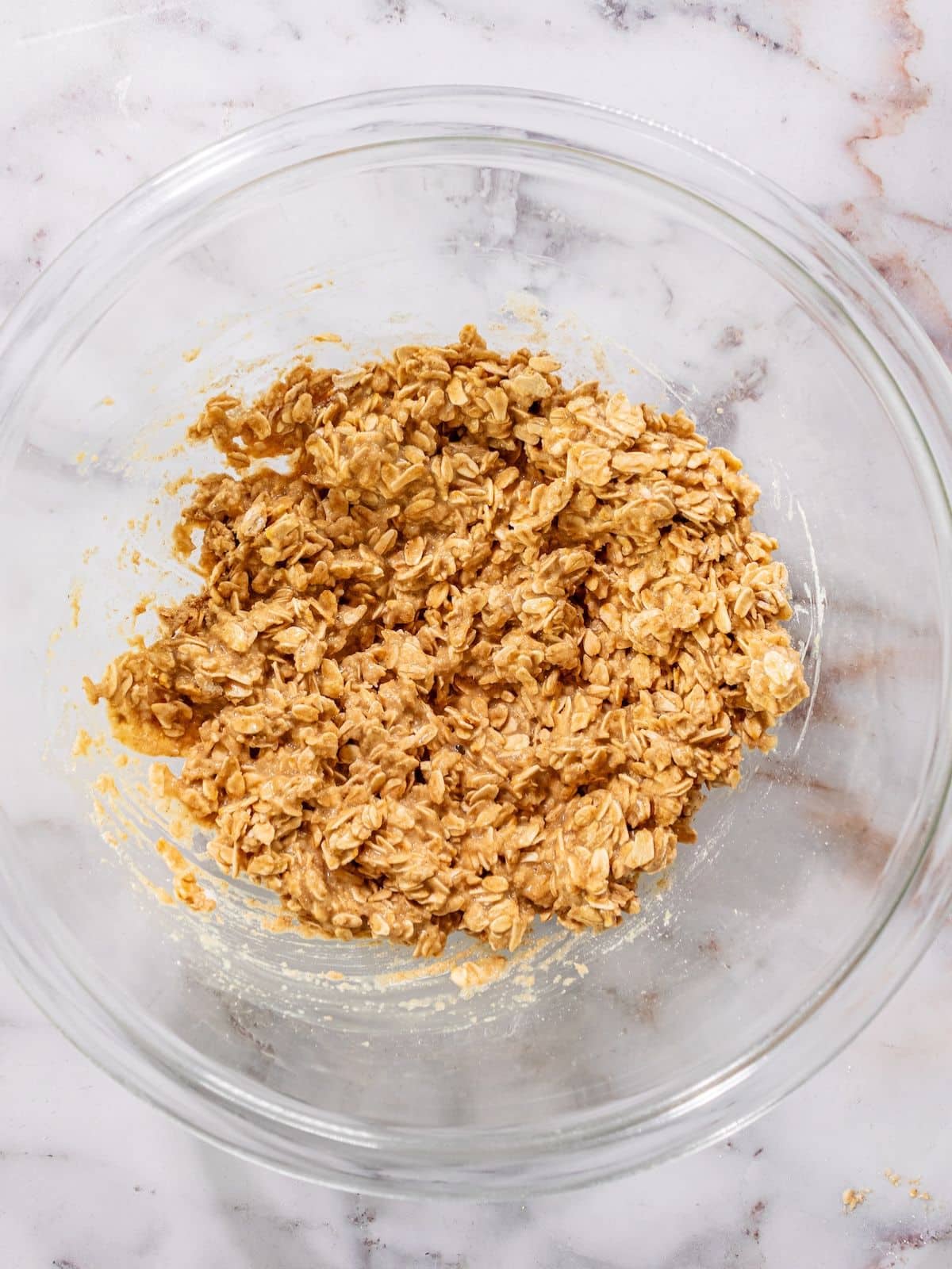 Maple syrup, applesauce and extra virgin olive oil added to the flour mixture.