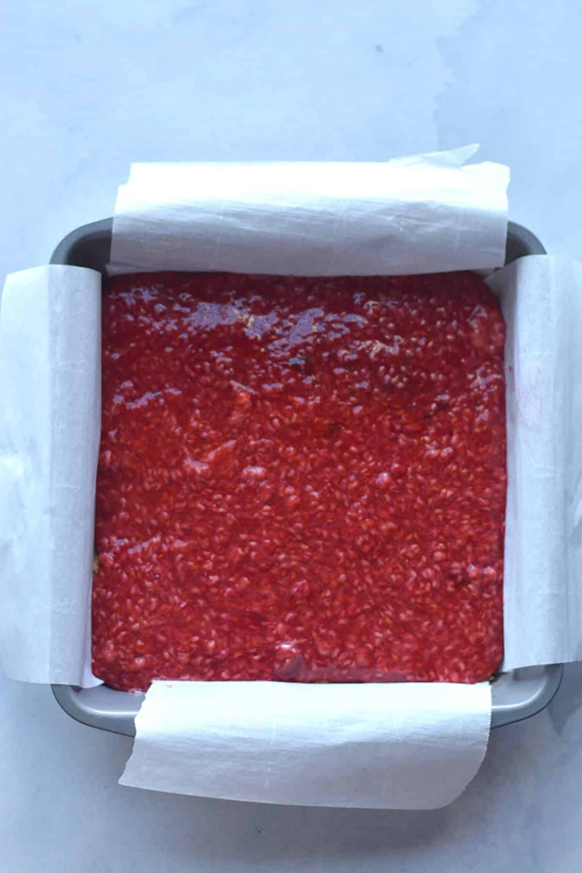 Raspberry filled put on top if the bottom crust.