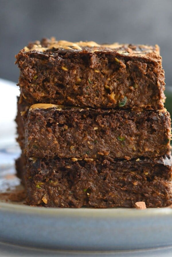 Healthy zucchini brownies on a plate.