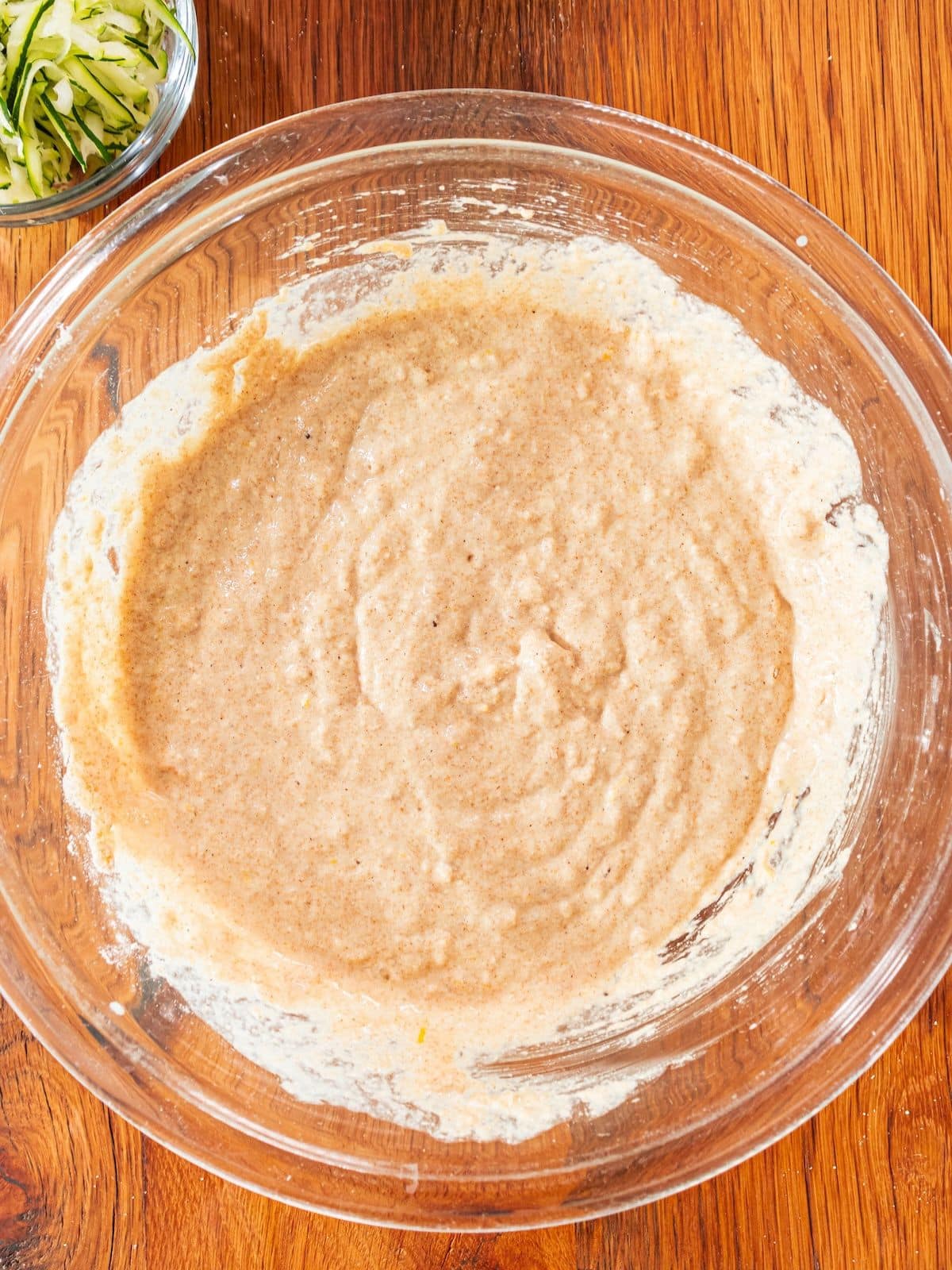 The wet and dry ingredients combined in a bowl.