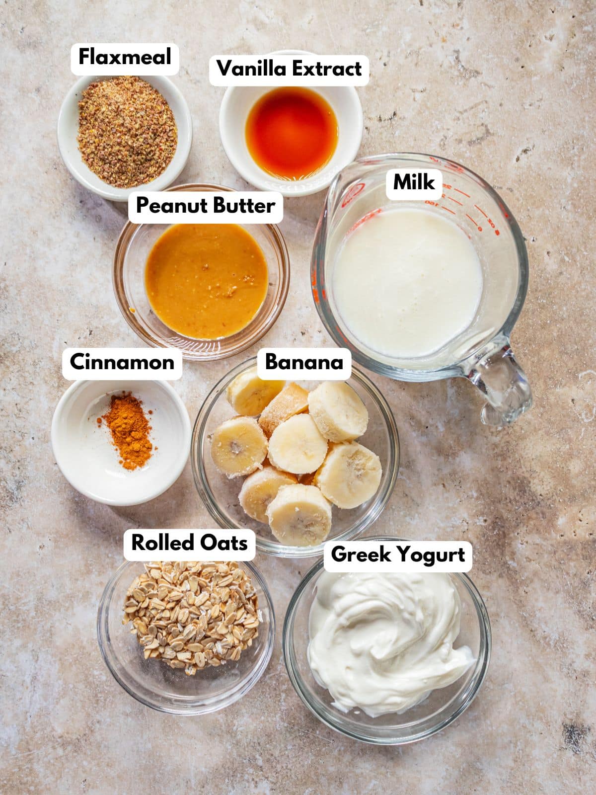 Ingredients to make this banana smoothie on a table.