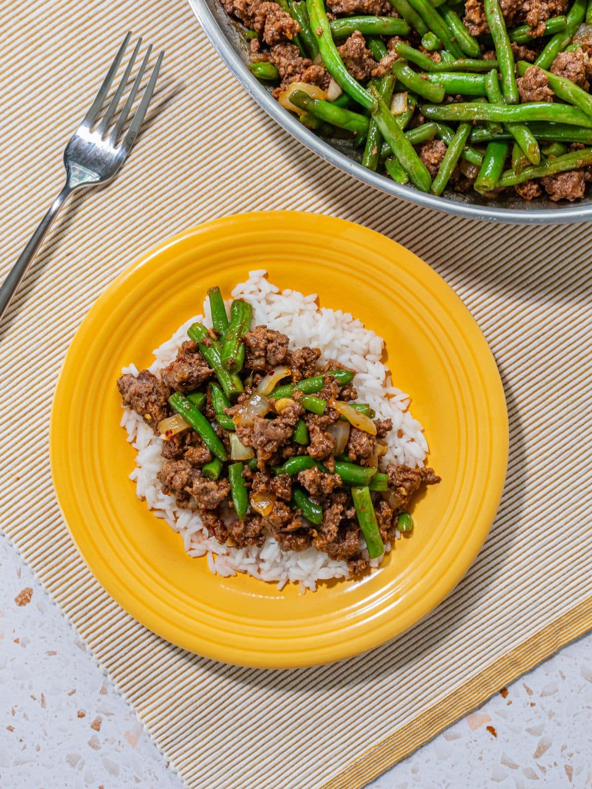 A plate with ground beef stir fry.