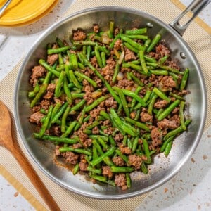 Ground beef stir fry in a pan.