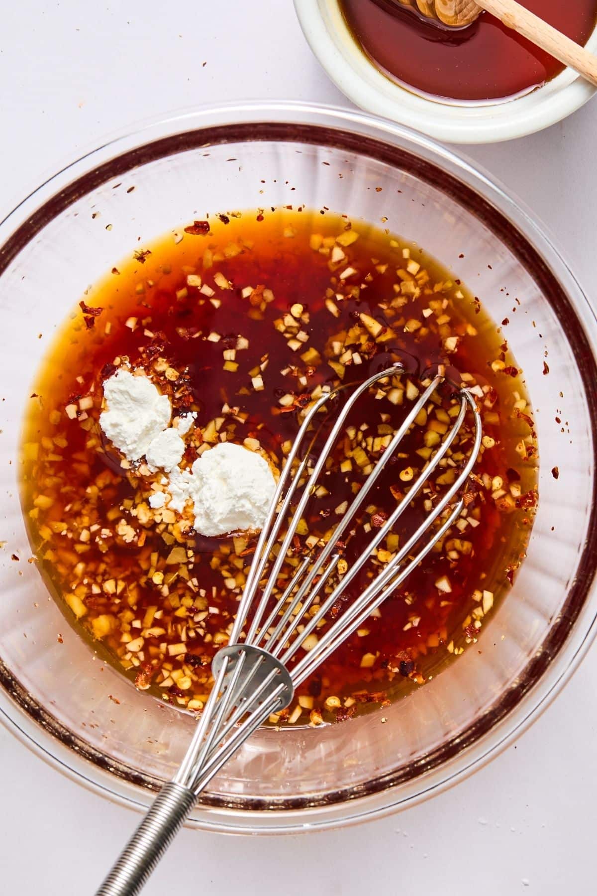 Ingredients to make the teriyaki sauce in a bowl.