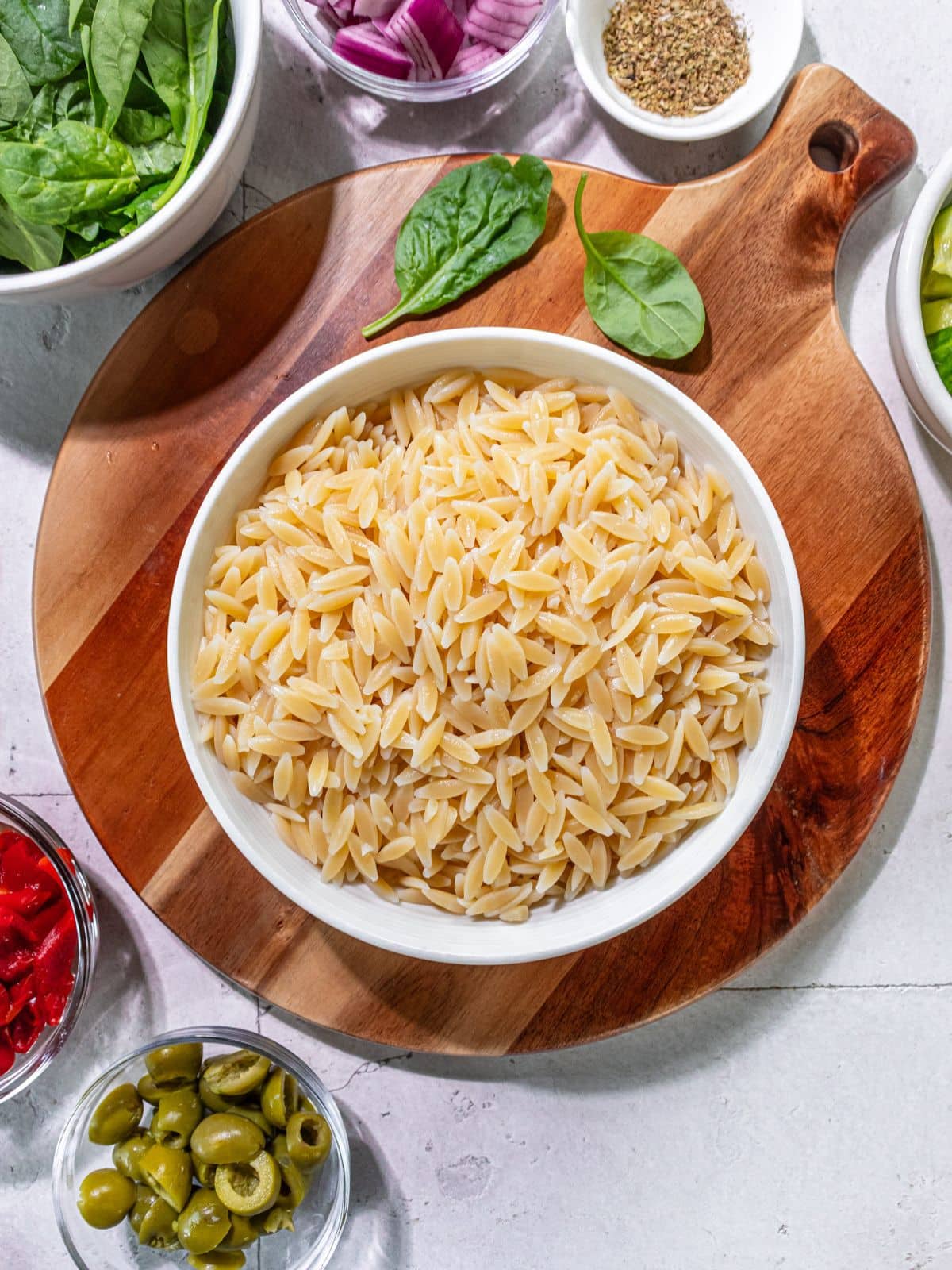 Cooked orzo in a bowl.
