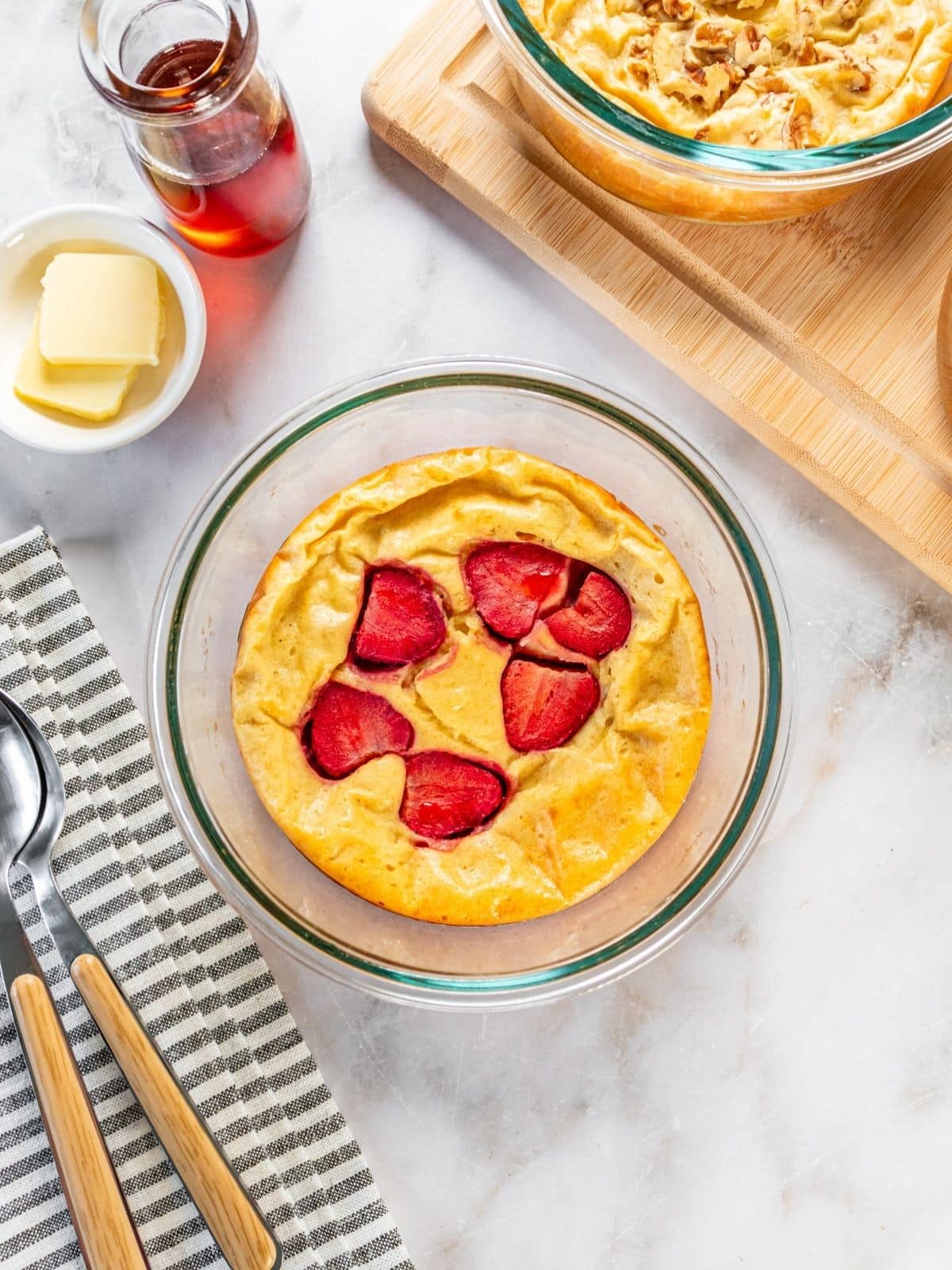 Strawberries in the middle of the pancake bowl.