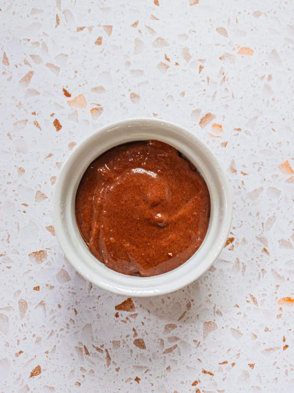 The mixture poured into a ramekin.