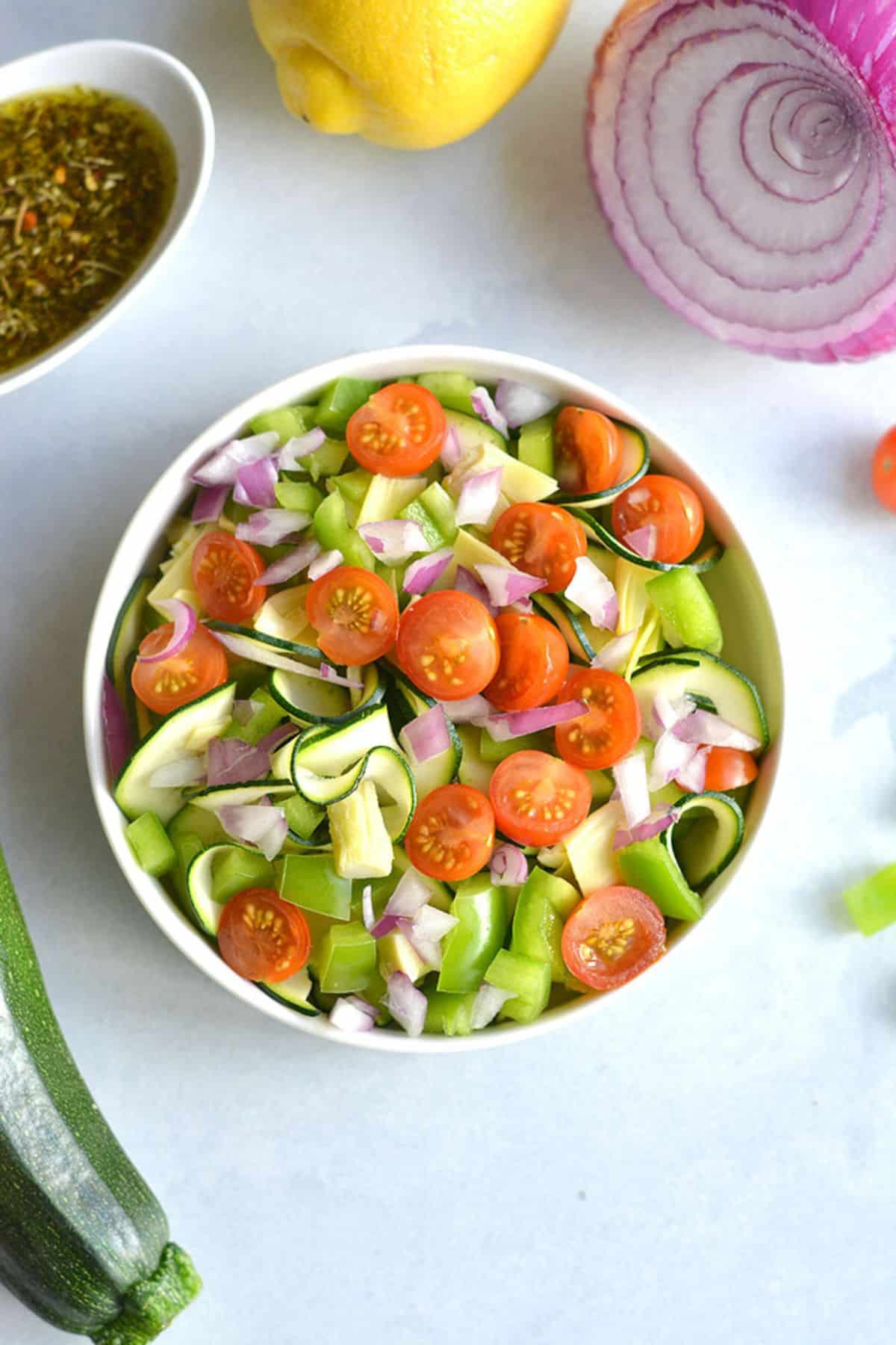 Zucchini salad with tomatoes and peppers.
