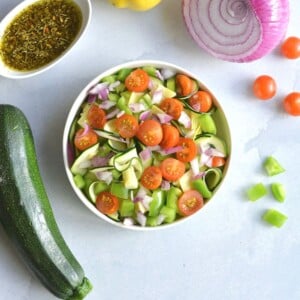 Zucchini noodle salad with the dressing on the side.