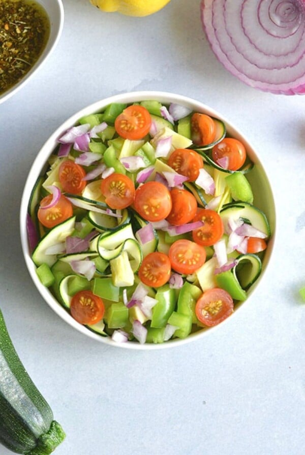 Zucchini noodle salad with the dressing on the side.