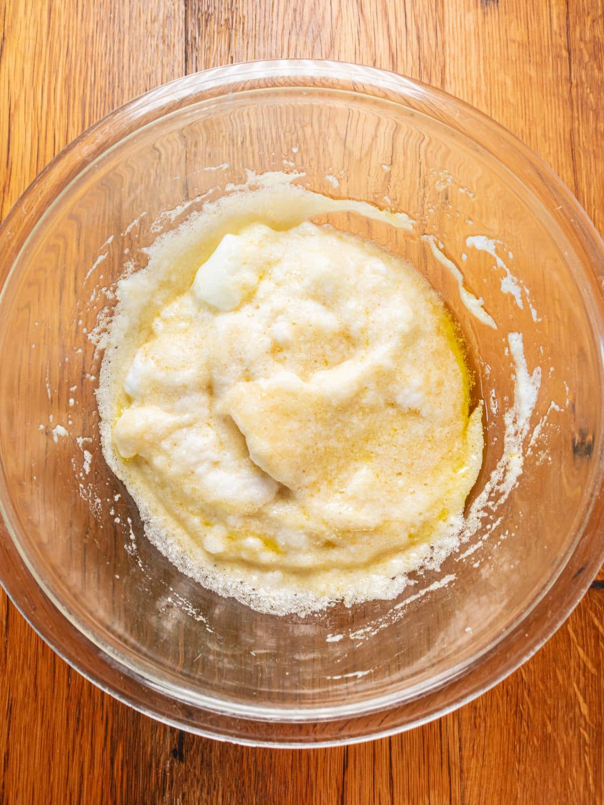 Sugar, vanilla, applesauce, maple syrup, eggs and oil to the bowl.