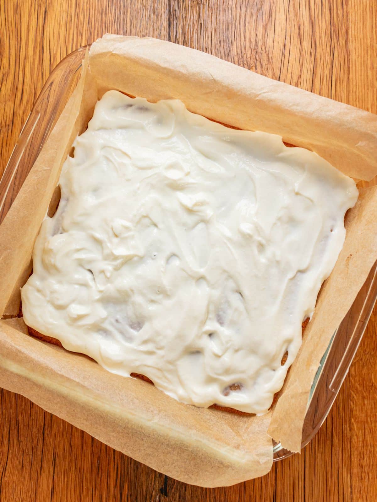The cream cheese spread added to the top of the crust.